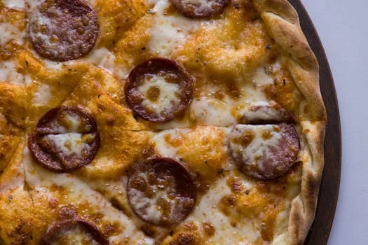 spicy pepperoni pizza with melted cheese